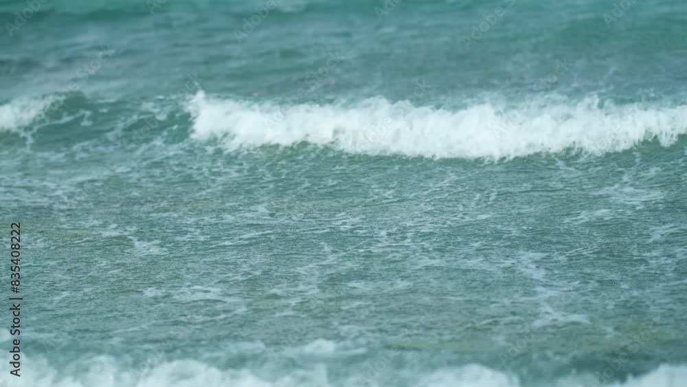Storm on the sea. White foam on Powerful stormy wave with wind and High waves ocean. White foam on wind. Wind breaks waves. Splashes Atlantic sea Storm on the sea. White foam on Powerful stormy wave with wind and High waves ocean. White foam on wind. Wind breaks waves. Splashes Atlantic sea