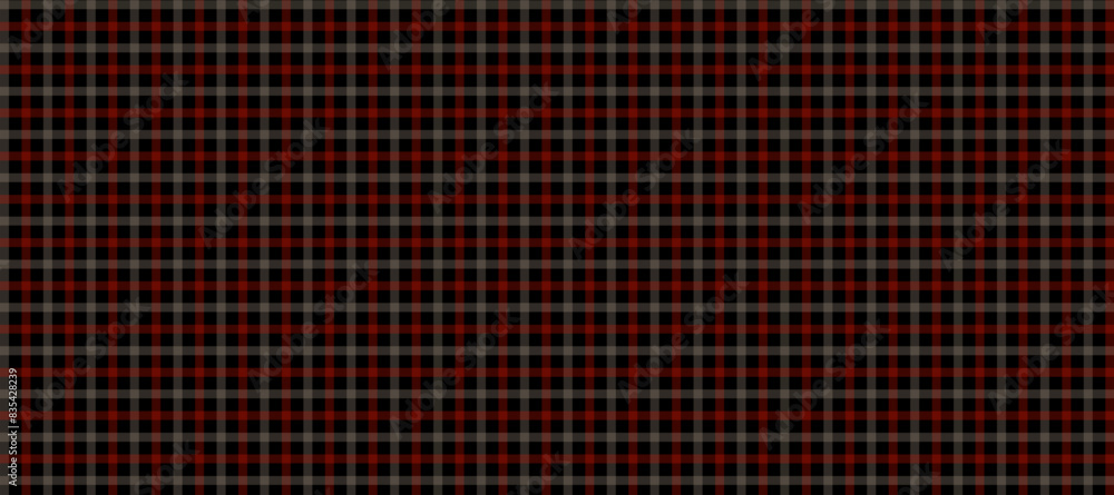 Red and beige plaid fabric texture in the black background Red and beige plaid fabric texture in the black background