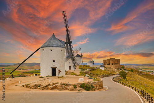 Old windmills in top of the hill in Consuegra Village photo