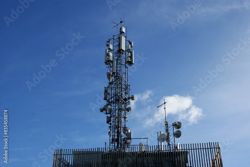Telecommunication tower. 5G radio network telecommunication equipment with radio modules and smart antennas.