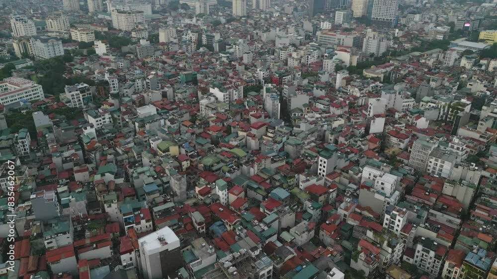 Aerial view of residential neighborhood roofs. Urban housing development from above. Top view. Real estate in Hanoi City, Vietnam. Property real estate. Aerial view of residential neighborhood roofs. Urban housing development from above. Top view. Real estate in Hanoi City, Vietnam. Property real estate.