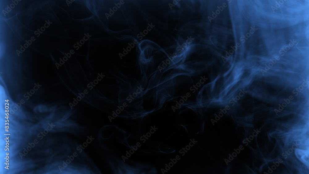 Obraz premium Blue smoke on black background