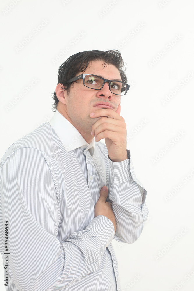 shy and insecure male nerd wearing glasses on white background looking up and thinking shy and insecure male nerd wearing glasses on white background looking up and thinking
