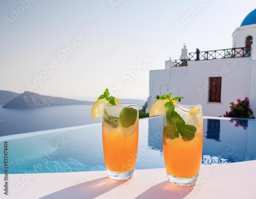 Fresh iced cocktails stand edge of pool in Mediterranean island holiday resort. Summer, holiday concept	 photo