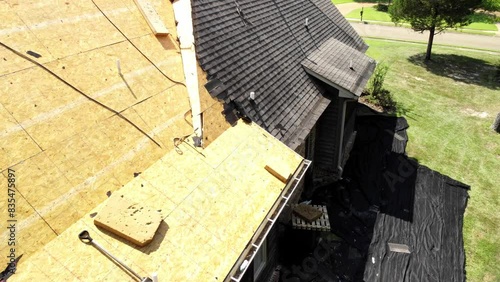 House with new roof being installed