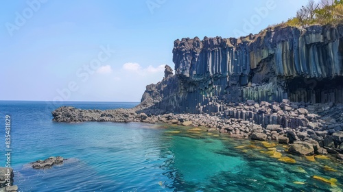 Rock formation Oedolgae in dark blue ocean at Seogwipo, Jeju Island, Korea photo