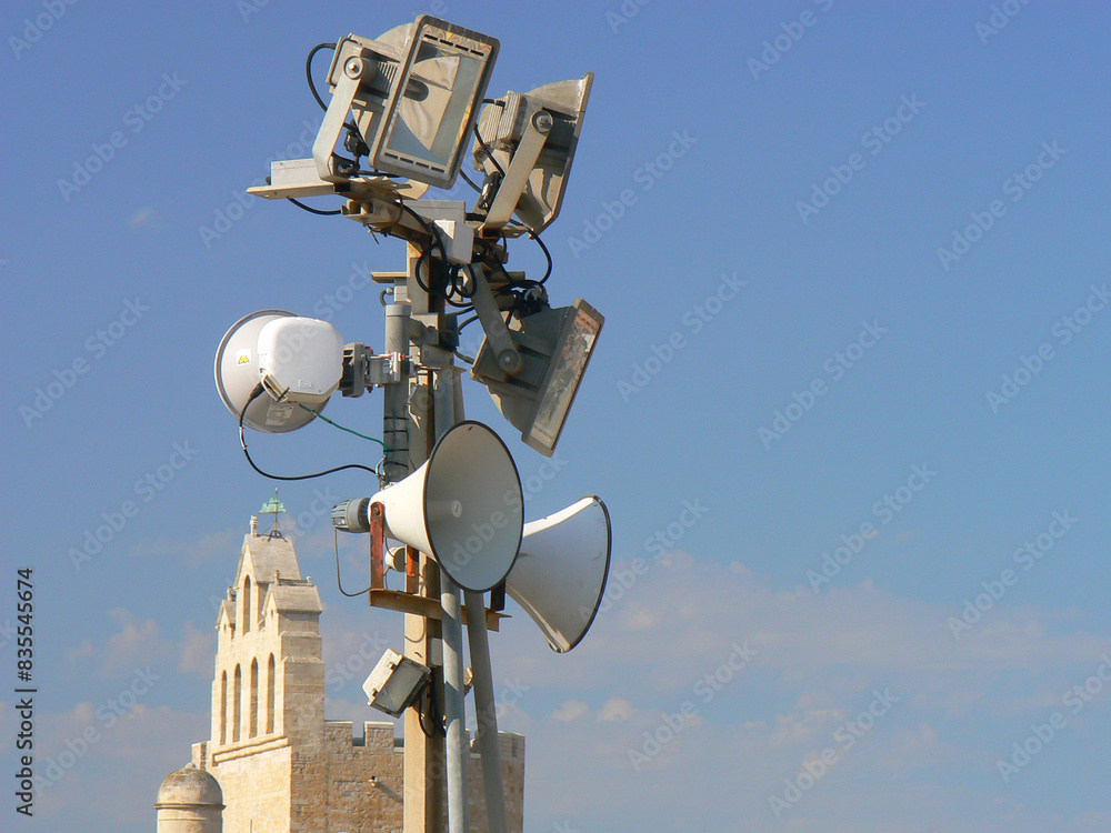 Picturesque pylon with lamps and speakers Picturesque pylon with lamps and speakers
