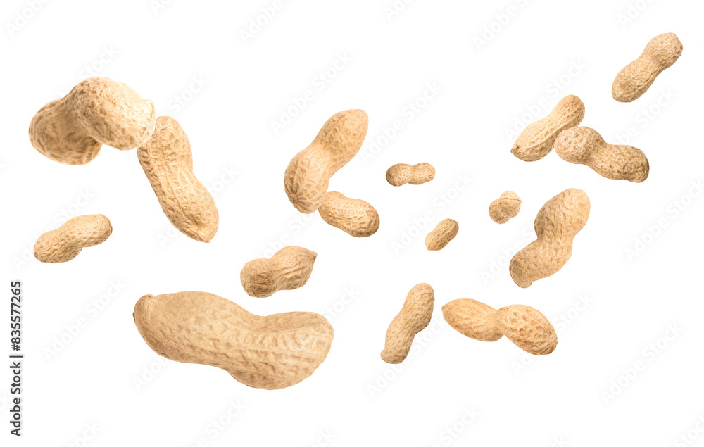 Unpeeled peanuts in air on white background Unpeeled peanuts in air on white background