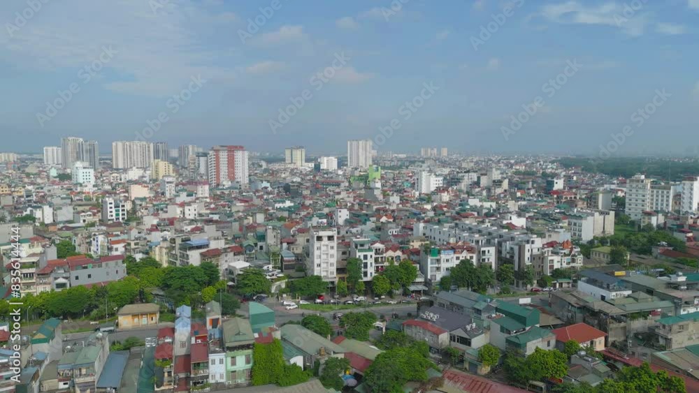 Aerial view of residential neighborhood roofs. Urban housing development from above. Top view. Real estate in Hanoi City, Vietnam. Property real estate. Aerial view of residential neighborhood roofs. Urban housing development from above. Top view. Real estate in Hanoi City, Vietnam. Property real estate.