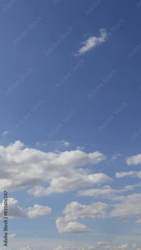 Vertical of Timelapse blue sky with clouds background Vertical of Timelapse blue sky with clouds background