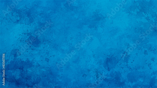 Abstract spray paint blue and white color on paper texture background. Blue background with faint texture and bright center and black vignette border, elegant luxury sapphire blue color in old vintage