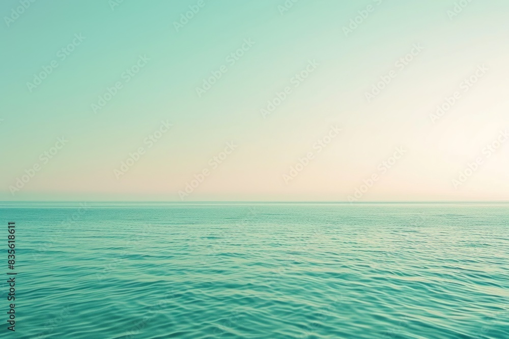 Fototapeta premium A calm blue ocean with a clear sky above