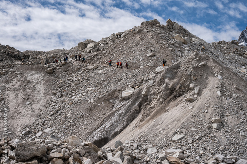 Group of tourist while trekking to Everest Base Camp in Nepal. Everest Base Camp Trek is undoubtedly the adventure of a lifetime and one of Nepal's best trekking destination. photo