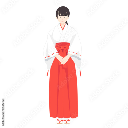 お辞儀をする神社の巫女さんのイラスト