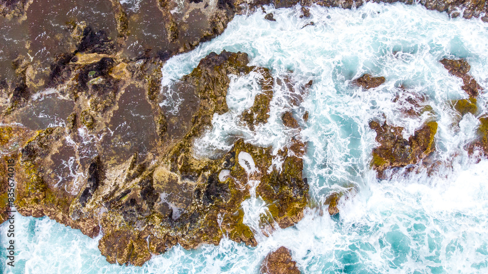 waves crashing on a rocky coastline