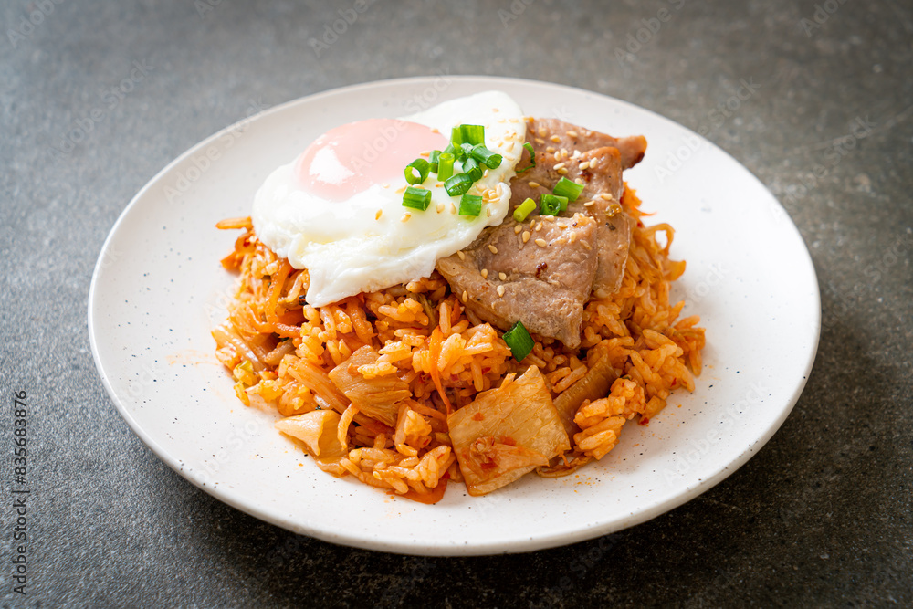 Kimchi fried rice with fried egg and pork Kimchi fried rice with fried egg and pork
