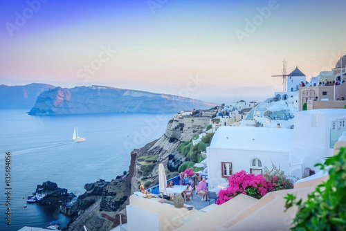 A beautiful beach with a boat sailing in the distance