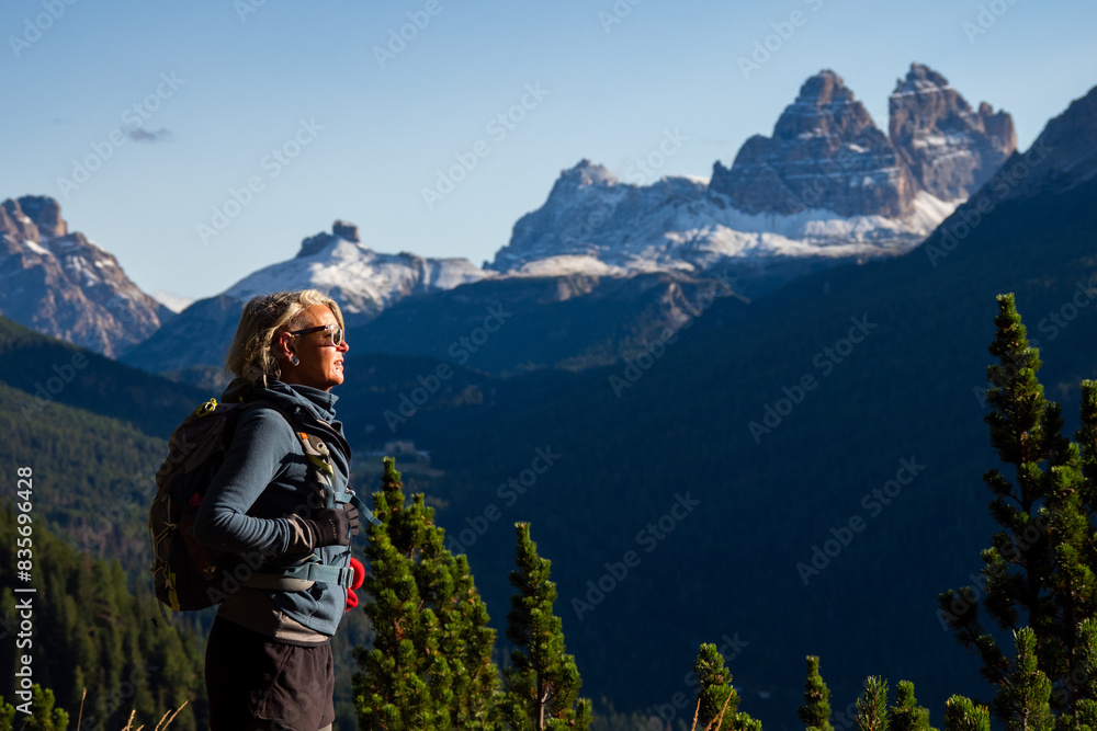 Female Hiker in the Dolomites, Hiking to the Lago di Sorapis in Italy Female Hiker in the Dolomites, Hiking to the Lago di Sorapis in Italy
