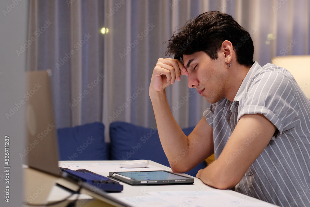 Man stressed, exhausted frome work at night, people negative expression Man stressed, exhausted frome work at night, people negative expression