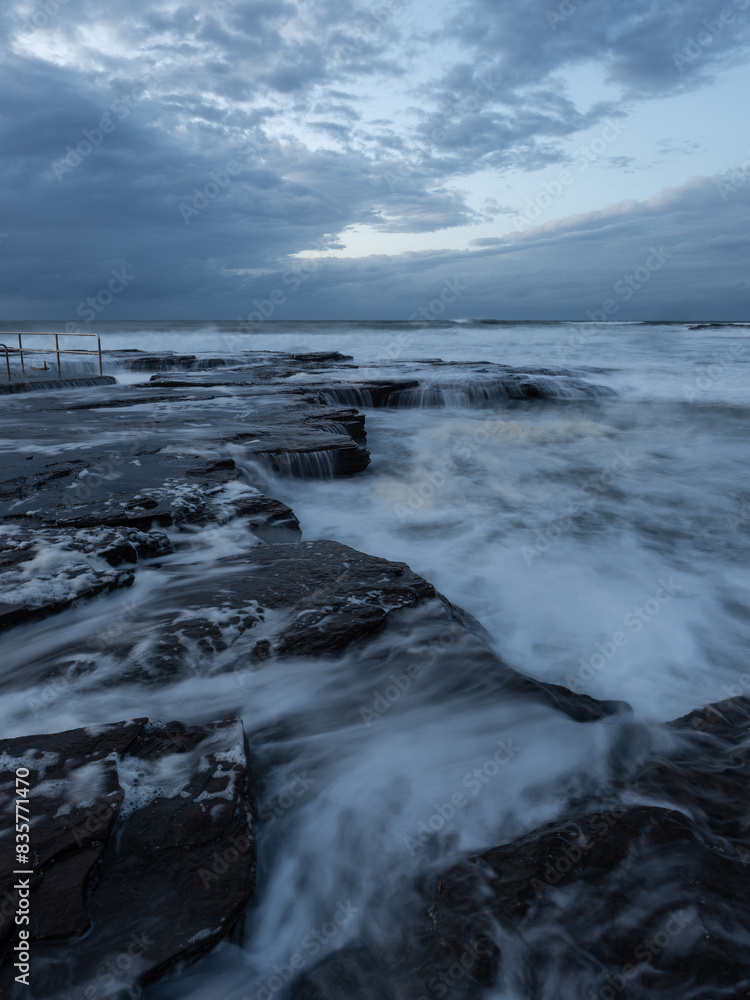 Cloudy morning view on the rocky coastline. Cloudy morning view on the rocky coastline.