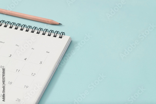 calendar on the blue. empty copy space for text. concept for busy timeline organize schedule,appointment and meeting reminder. planning for business meeting or travel holiday planning concept.