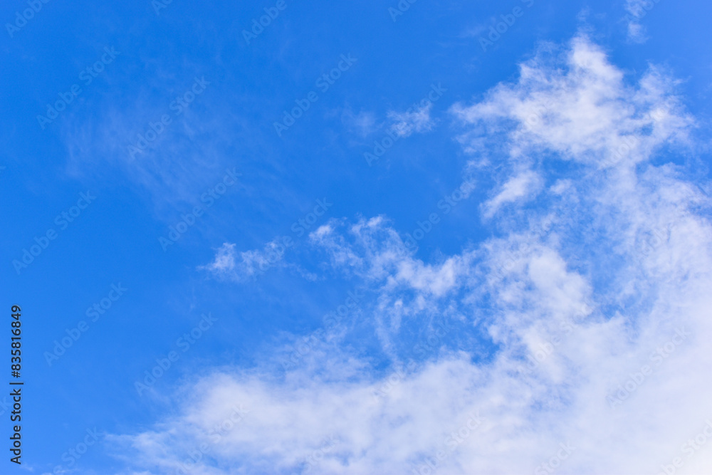 beautiful blue sky and white fluffy group of clouds with sunrise in the morning, natural background beautiful blue sky and white fluffy group of clouds with sunrise in the morning, natural background