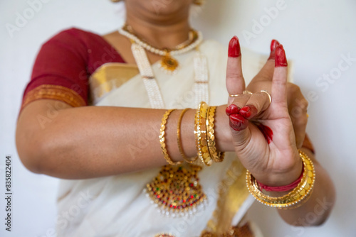 Bharatanatyam Indian classical dance mudra demonstration by female classical dancer. photo