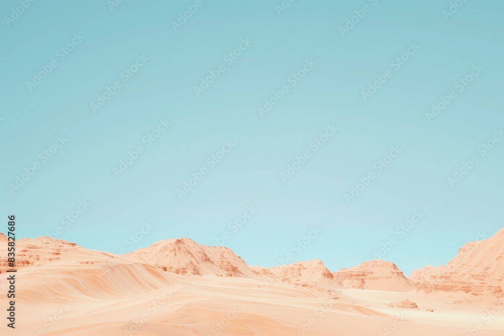 Naklejka premium Majestic desert landscape under clear blue sky with sandy dunes and rocky mountains