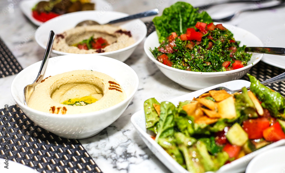 White Bowls Filled With Assorted Food on a Table White Bowls Filled With Assorted Food on a Table