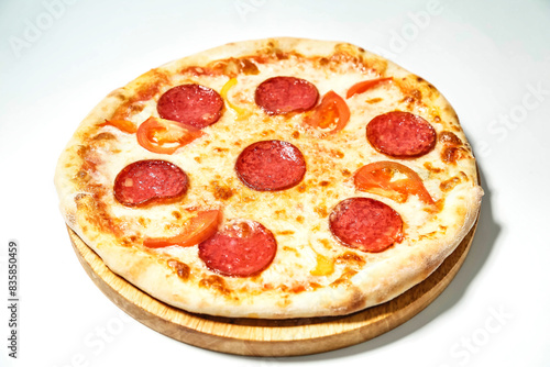 Pepperoni and Pepperoni Pizza on Wooden Plate