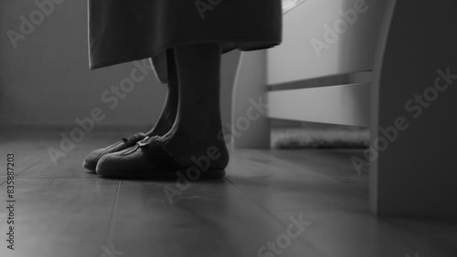 Soft photo of woman's feet with slippers, top view point. Cozy, comfy, soft
