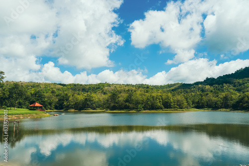 Lake with clear blue sky and white clouds  beautiful endless green mountains and waters at Jedkod Pongkonsao Natural Study in Saraburi  Thailand