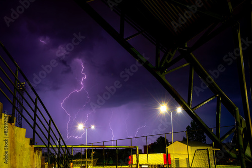 lightning at night in an outdoor park in an urban environment