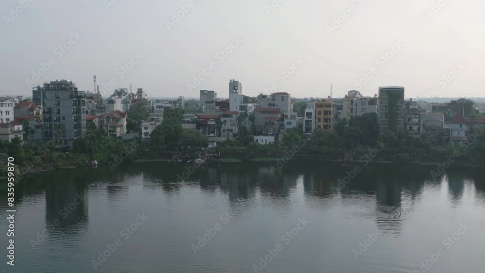 Aerial view of residential neighborhood roofs. Urban housing development from above. Top view. Real estate in Hanoi City, Vietnam. Property real estate. Aerial view of residential neighborhood roofs. Urban housing development from above. Top view. Real estate in Hanoi City, Vietnam. Property real estate.