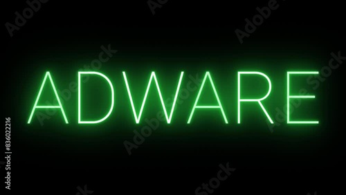 Flickering glowing green Adware neon sign animated black background photo