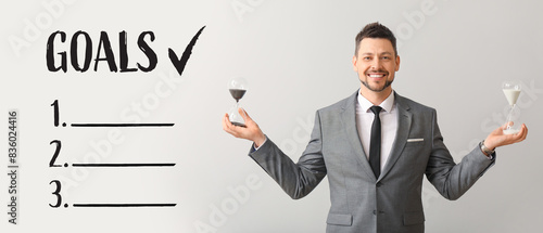Businessman with hourglasse...