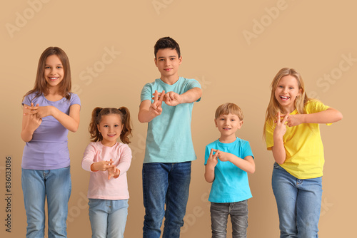Group of cute kids making h...