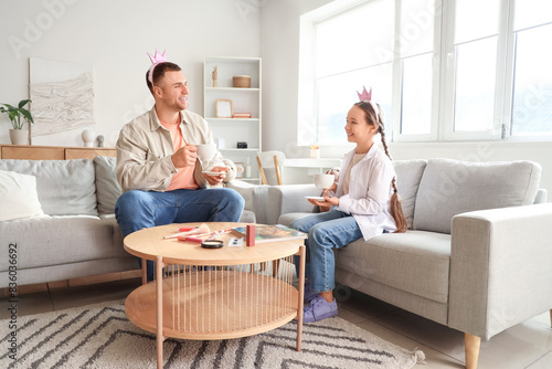 Father and his daughter hav...