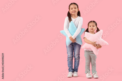 Cute little Asian happy sis...