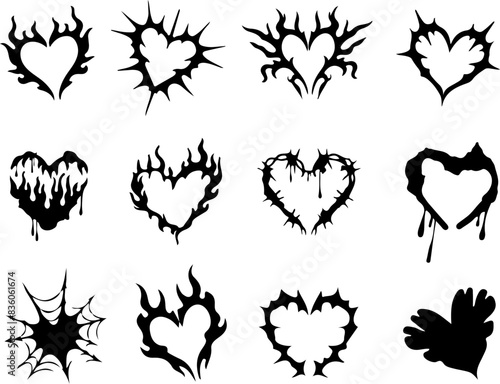 
Icon set of heart with gothic goth rock punk retro style. Stylish heart tattoo sticker. Flame flamed shape. Flat icons vector illustrations isolated on transparent background photo