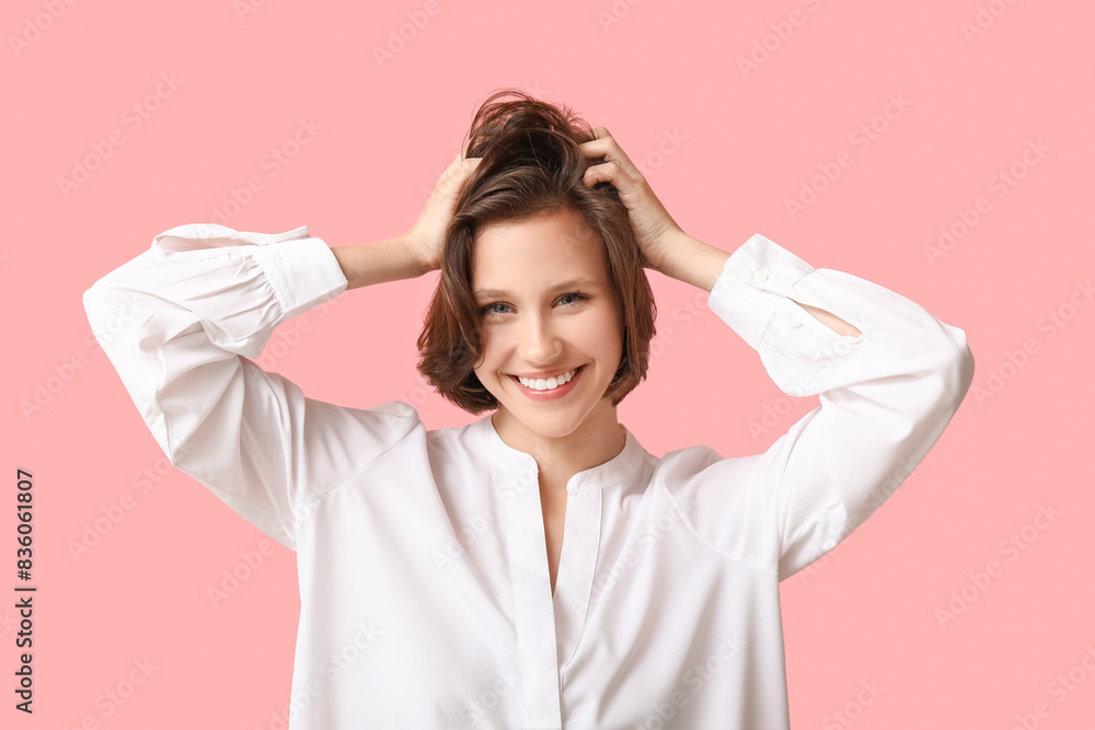Beautiful young happy woman with bob hairstyle on pink background Beautiful young happy woman with bob hairstyle on pink background