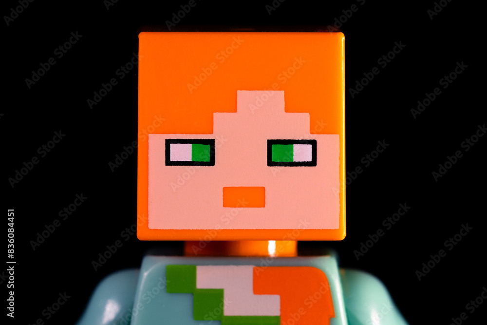 Naklejka premium Face of LEGO Minecraft Alex with red hair and green eyes