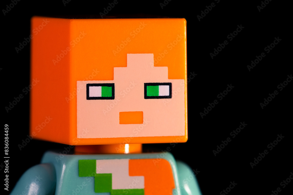 Naklejka premium Face of LEGO Minecraft Alex with red hair and green eyes