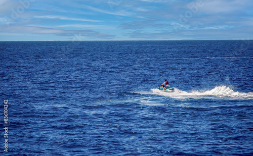 Obraz na płótnie Jet ski in the coastal side of gran canaria puerto against blue sky in Spain, Atlantic ocean w salonie