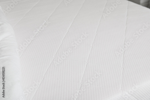 Clean white mattress topper...