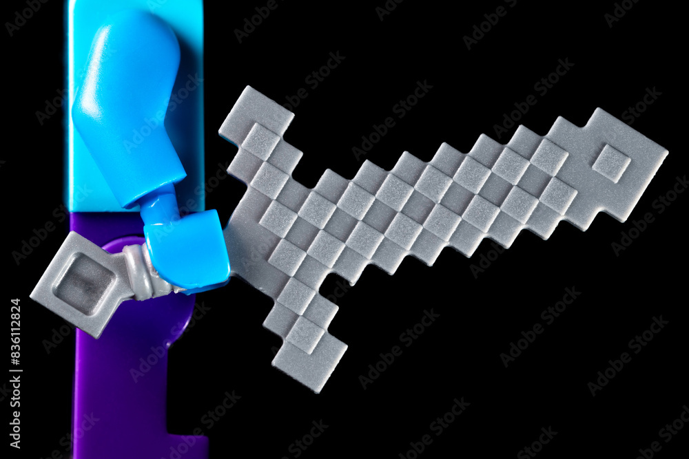 Fototapeta premium LEGO Minecraft sword in the hands of a mob