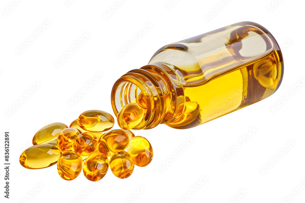 Close-up of a jar with yellow capsules spilling out. Represents health, vitamins, and supplement concepts. Close-up of a jar with yellow capsules spilling out. Represents health, vitamins, and supplement concepts.