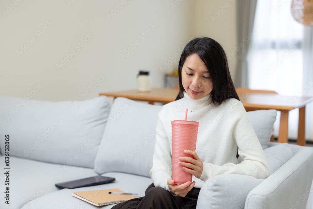 Woman drink of water bottle at home Woman drink of water bottle at home