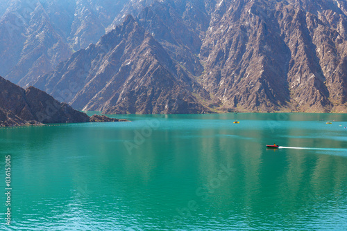 landscape view of Hatta dam lake and Hajar mountain in the Dubai, United Arab Emirates photo