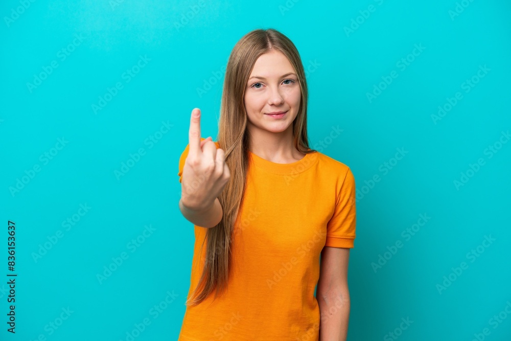 Young Russian woman isolated on blue background doing coming gesture Young Russian woman isolated on blue background doing coming gesture